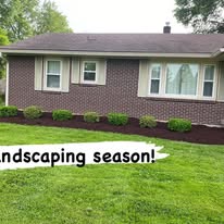 Southern Indiana brick home exterior with roofline and gutters visible