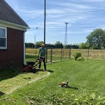 Red mulch beds around a home